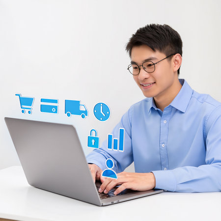 Young asian man using laptop for online shopping. Internet shopping concept.の素材