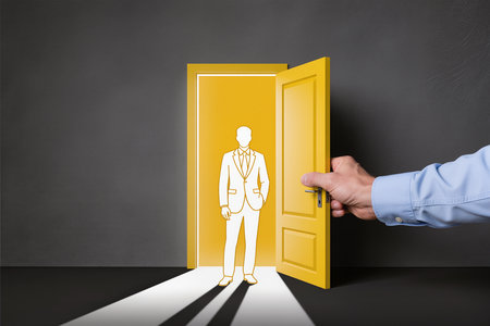 businessman hand open yellow door with business man silhouette on the doorの素材