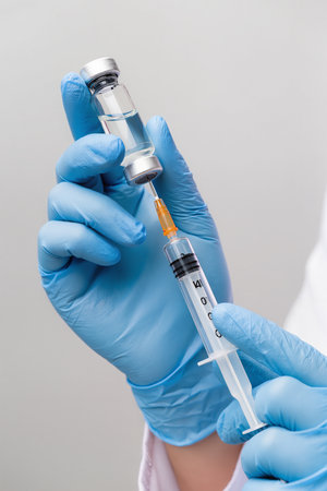 vaccines fight against virus covid-19 corona virus, doctor or scientist in laboratory holding a syringe with liquid vaccines for children or older adults, Concept-diseasesの素材