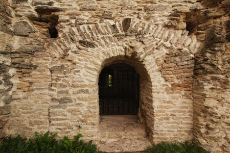 Doorway to the old fortress wall in Russian, Izborskの写真素材