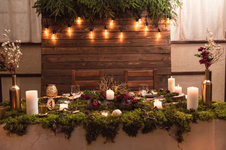 Wonderful magical interior of table for newlyweds table in rustic style with natural decor.の写真素材