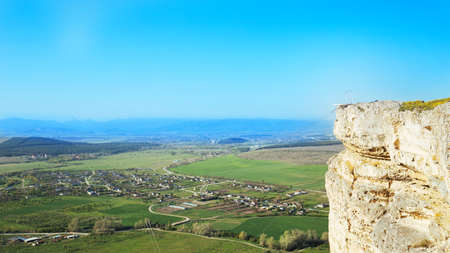 Side View of White rock or Aq Qaya on a Sunny summer day. Crimea. White limestone with a vertical...