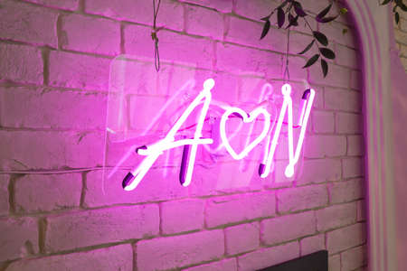 Beautiful composition with flowers on the tables and candles for guests at a wedding or a birthday party.の写真素材