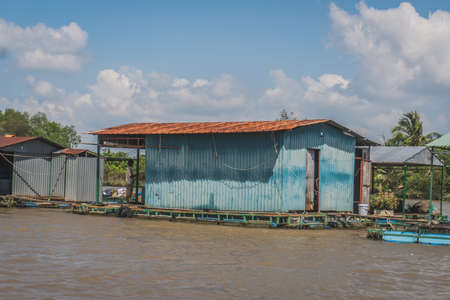 Floating house on the Mekong River in Vietnam, South East Asia. Ho Chi Minh, Vietnam - March 19, 2020のeditorial素材
