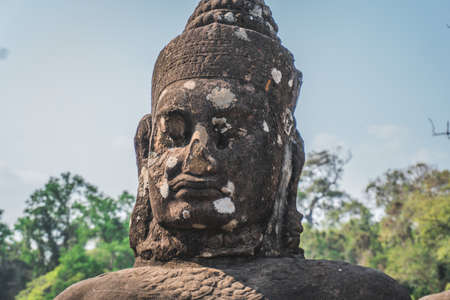 Ancient Angkor Wat Ruins Panorama. Giants in Front Gate of Angkor Thom. Siem Reap, Cambodia - FEBRUARY 25, 2020のeditorial素材