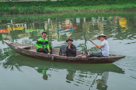 Daily life of the local people in Hoi an, the beautiful ancient town of Vietnam. Hoi An (Hoian), Vietnam - March 12, 2020.のeditorial素材