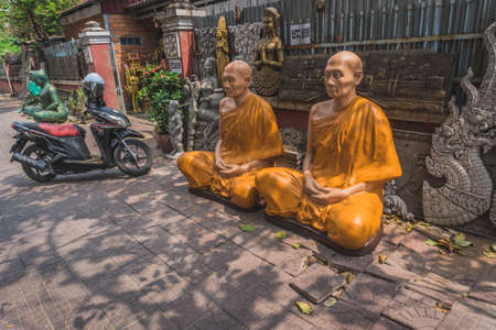 Stone Buddhist monks. Phnom Penh, Cambodia - FEBRUARY 22, 2020のeditorial素材