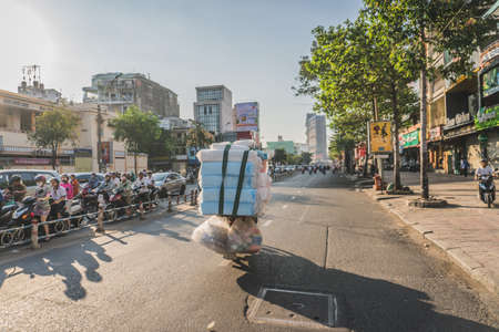 Busy Rush Hour Traffic In Vietnam. Ho Chi Minh, Vietnam - March 19, 2020のeditorial素材