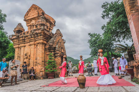 Vietnamese women dancing a traditional dance. Nha Trang, Vietnam - March 15, 2020.のeditorial素材