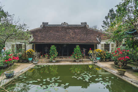 Traditional Vietnamese home. Buddhist temple traditional Vietnamese decor. Hue, Vietnam - March 12, 2020のeditorial素材