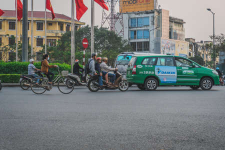 Busy Rush Hour Traffic In Vietnam. Hue, Vietnam - March 12, 2020のeditorial素材