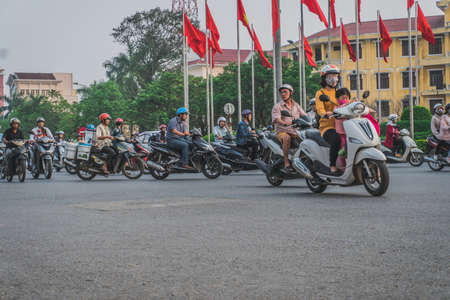 Busy Rush Hour Traffic In Vietnam. Hue, Vietnam - March 12, 2020のeditorial素材