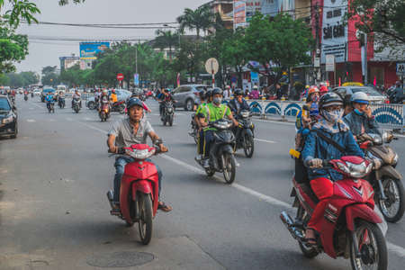 Busy Rush Hour Traffic In Vietnam. Hue, Vietnam - March 12, 2020のeditorial素材