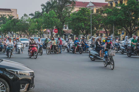 Busy Rush Hour Traffic In Vietnam. Hue, Vietnam - March 12, 2020のeditorial素材