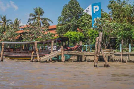 Destroyed house on the river bank. Mekong River in Vietnam, South East Asia. Vung Tau, Vietnamの写真素材