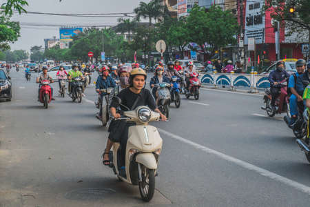 Busy Rush Hour Traffic In Vietnam. Hue, Vietnam - March 12, 2020のeditorial素材