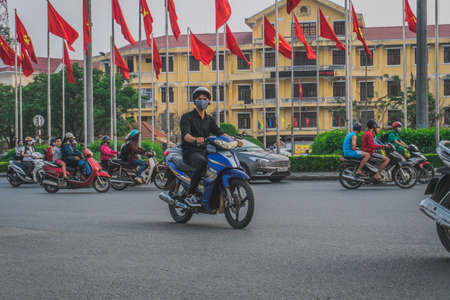 Busy Rush Hour Traffic In Vietnam. Hue, Vietnam - March 12, 2020のeditorial素材