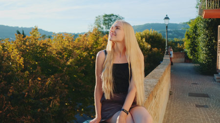 Blonde young woman relaxing and smiling. Natural beauty. Having fun on summer time.の写真素材