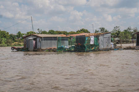 Floating house on the Mekong River in Vietnam, South East Asia. Vung Tau, Vietnamの写真素材