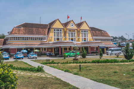 Ancient station is famous place, history destination for traveler, with railway, antique train transport tourist to visit. Dalat, Vietnam - March 17, 2020のeditorial素材