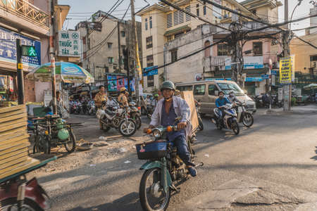 Busy Rush Hour Traffic In Vietnam. Ho Chi Minh, Vietnam - March 19, 2020のeditorial素材