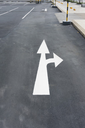 traffic sign go Straight on or Turn right in waterの写真素材