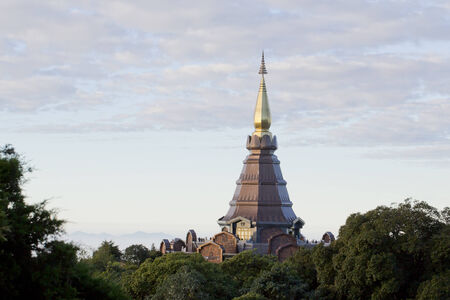 A beautiful pagoda on top of the mountain, Thailand の写真素材