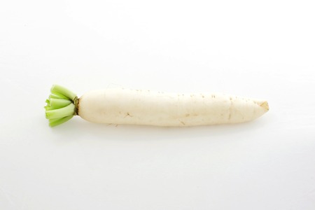 Daikon radishes isolated on white backgroundの写真素材