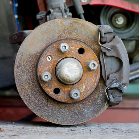 Closeup photo of car disc brakes servicingの写真素材