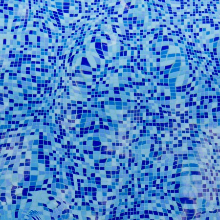 Blue ripped water in swimming poolの写真素材