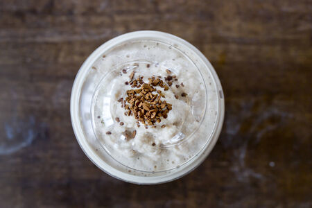 top view of Ice Coffee on the wooden tableの写真素材