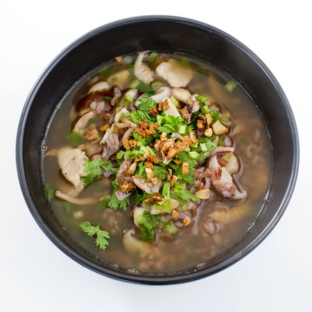 rice congee mixed with meat or rice gruel with pork, dried shrimp, dried squid and shiitake. (Thai...