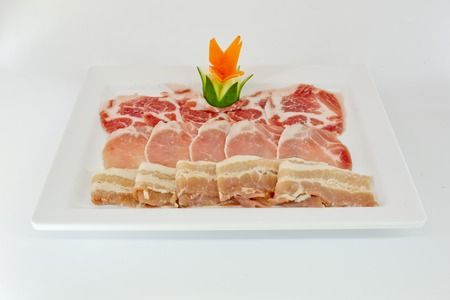 Assorted Fresh Cured Meats on white dish isolateの写真素材