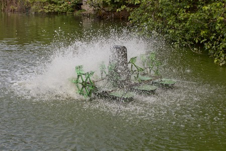 Stop action of water and aerator turbine in poolの写真素材