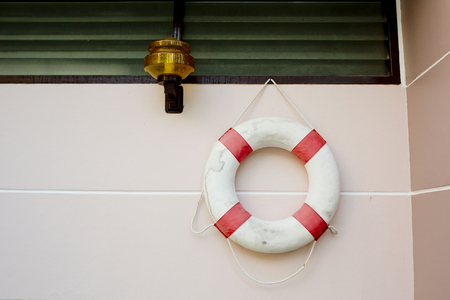 life vest on white wall.の写真素材