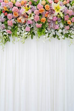 floral backdrop in cozy room at the weddingの写真素材