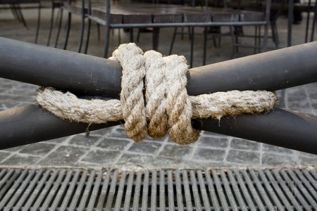 Close up of a rope tied onto terrace