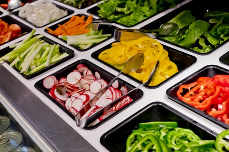 salad bar with vegetables in the restaurant, healthy foodの写真素材