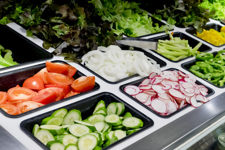 salad bar with vegetables in the supermarket, healthy foodの写真素材