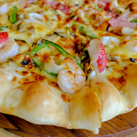 Pizza cheese crust seafood toppingの写真素材