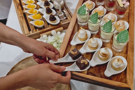 catering dessert line in wedding ceremonyの写真素材
