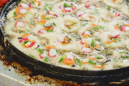 mussel and crab stick fried in egg batter (mussel and crab stick omelette)の写真素材