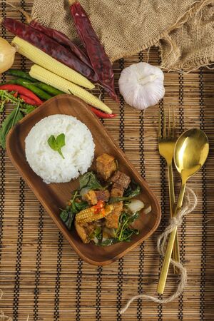 Crispy pork belly with Thai basil. Classic Thai dishの写真素材