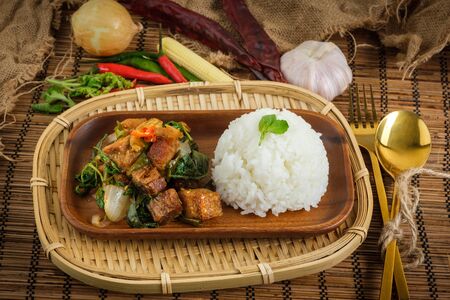 Crispy pork belly with Thai basil. Classic Thai dishの写真素材