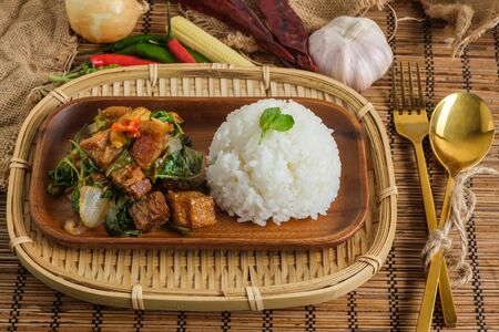 Crispy pork belly with Thai basil. Classic Thai dishの写真素材