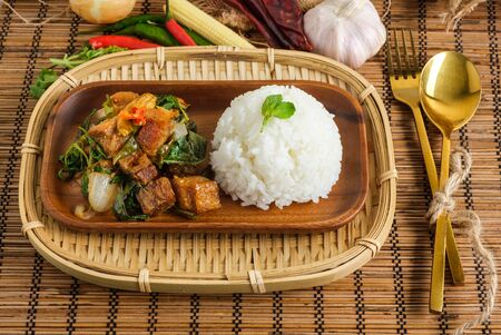 Crispy pork belly with Thai basil. Classic Thai dishの写真素材