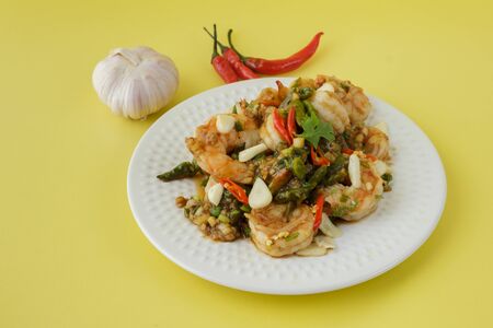 Stir-fried shrimp with chilli with garlic and chilli and spoon aの写真素材