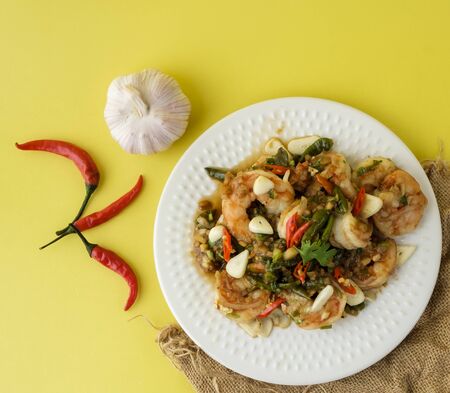 Stir-fried shrimp with chilli with garlic and chilli and spoon aの写真素材