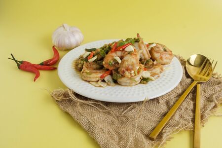 Stir-fried shrimp with chilli with garlic and chilli and spoon aの写真素材