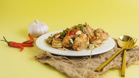 Stir-fried shrimp with chilli with garlic and chilli and spoon aの写真素材